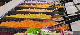 A salad and vegetarian buffet reflective of healthy menus for students. 