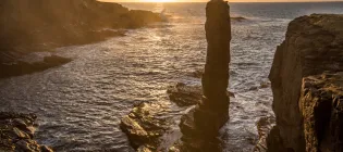 Winter sunset at Yesnaby sea stack Orkney- Credit- HelenL100- Getty Images