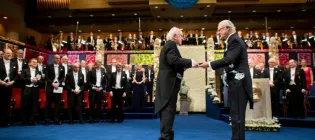 The late Professor Higgs receives his Nobel Prize medal. Credit- AB Alexander Mahmoud.