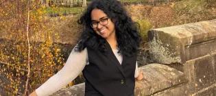 sanchita smailes to camera