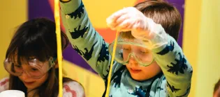 Children playing with slime in Edinburgh's Science's splat-tastic workshop