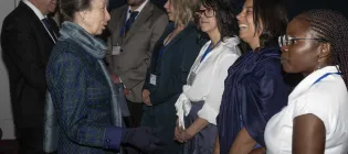 Picture of Her Royal Highness The Princess Royal speaking with Edinburgh Ocean Leaders at a celebration event