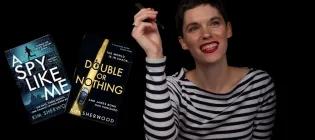 Kim Sherwood posing with two book covers