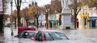 cars in a flooded town centre
