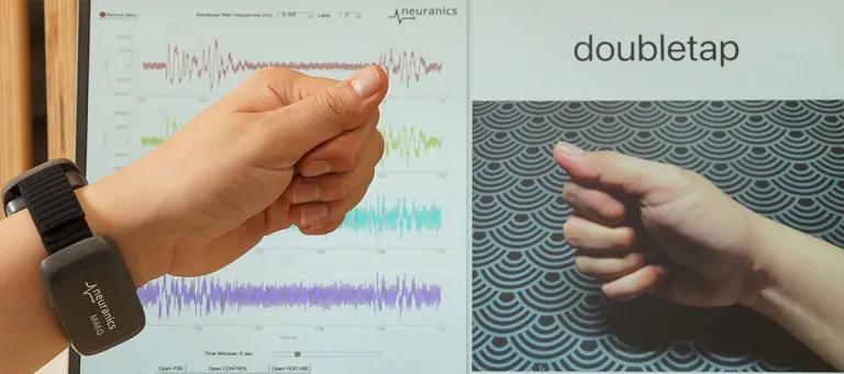 A hand with a wrist worn high-precision sensor by Neuranics