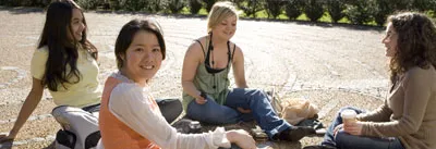 Students sitting on the ground