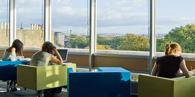 Students using one of the study areas in the main library