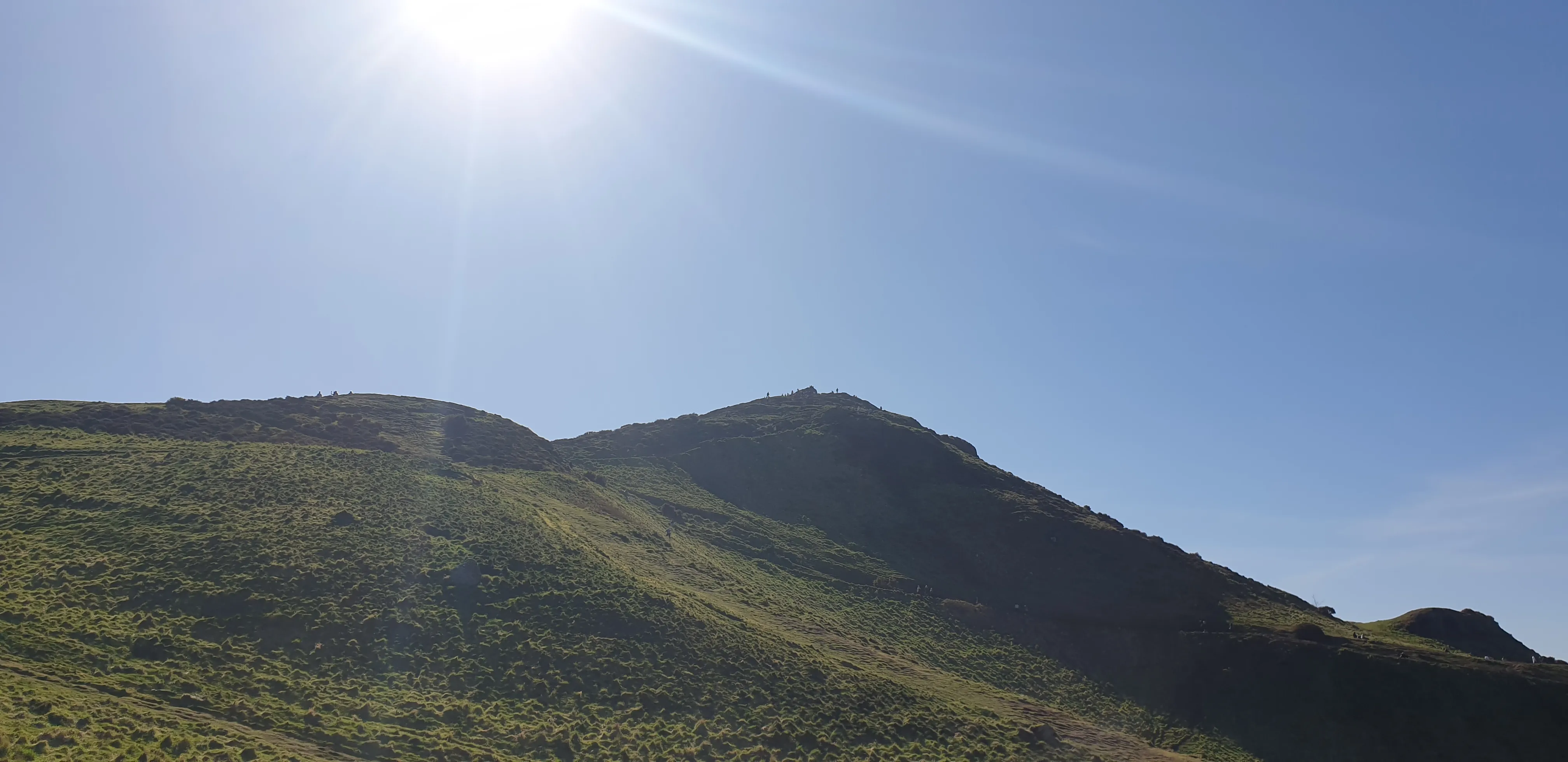 The top of Arthur's Seat in Edinburgh basking in sunshine