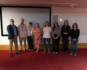 photograph of student with James Saville from the 2021 career ready cohort celebration event