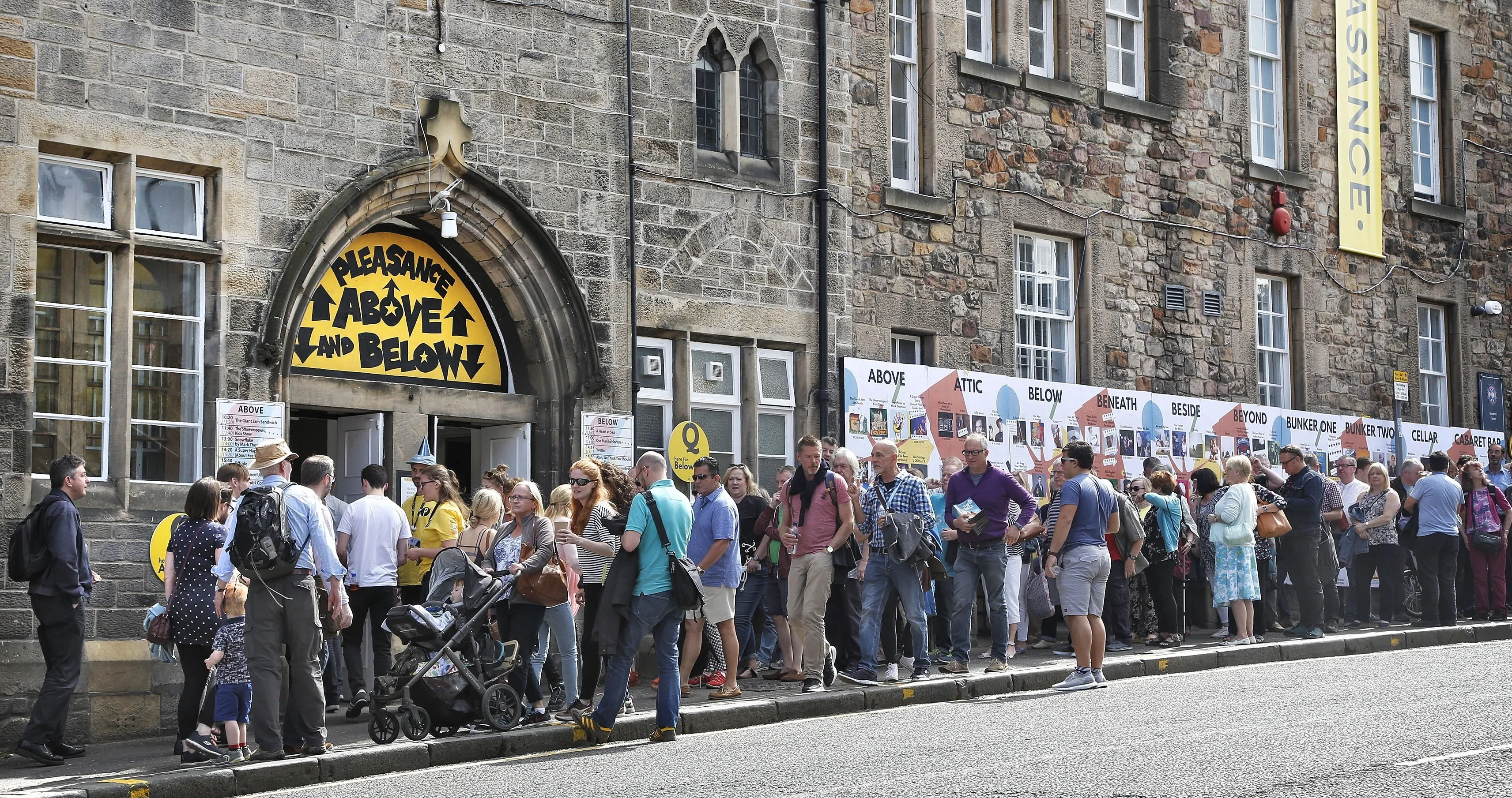 People queue for a festival show