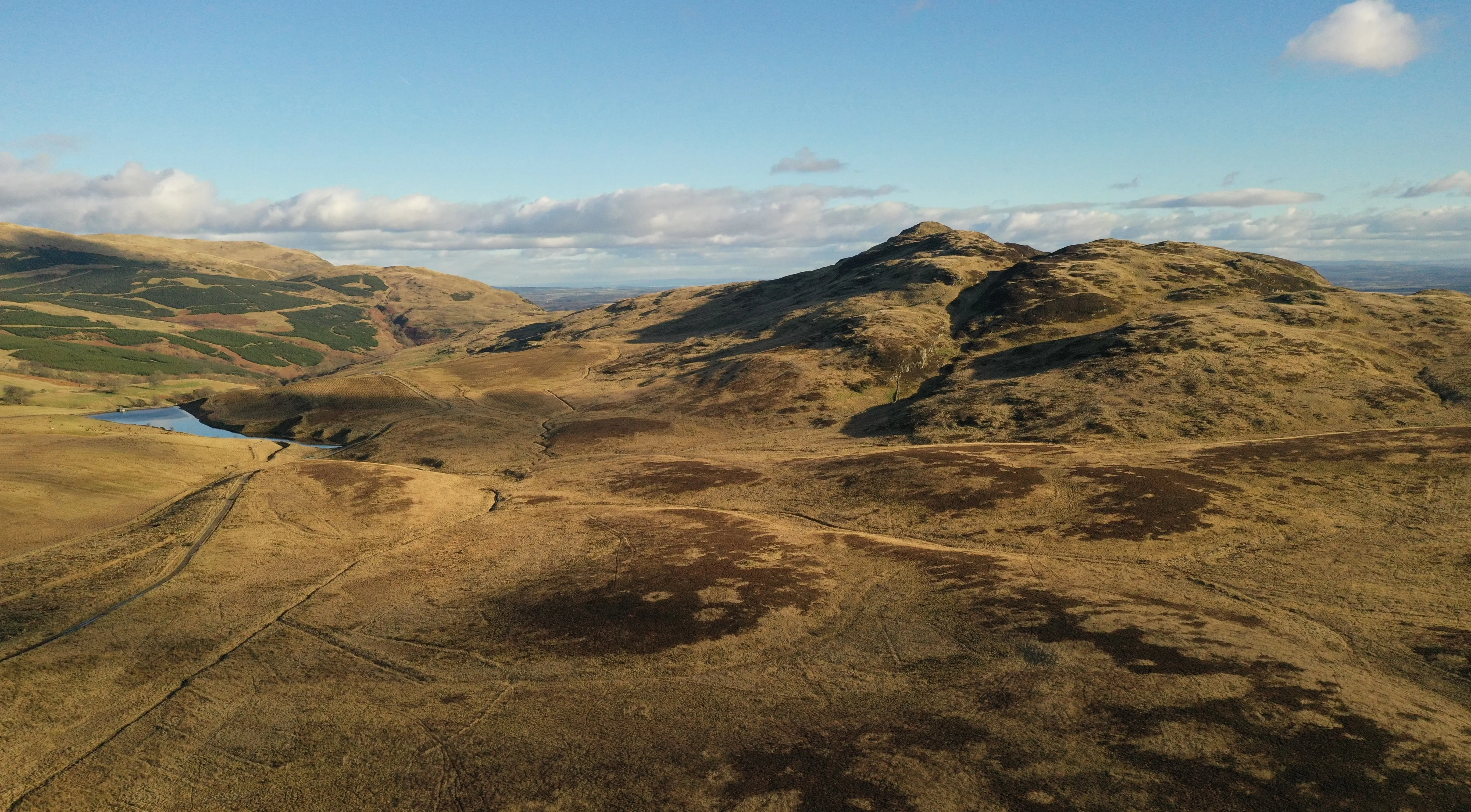 an aerial view of the Stirlingshire hills on a clear day