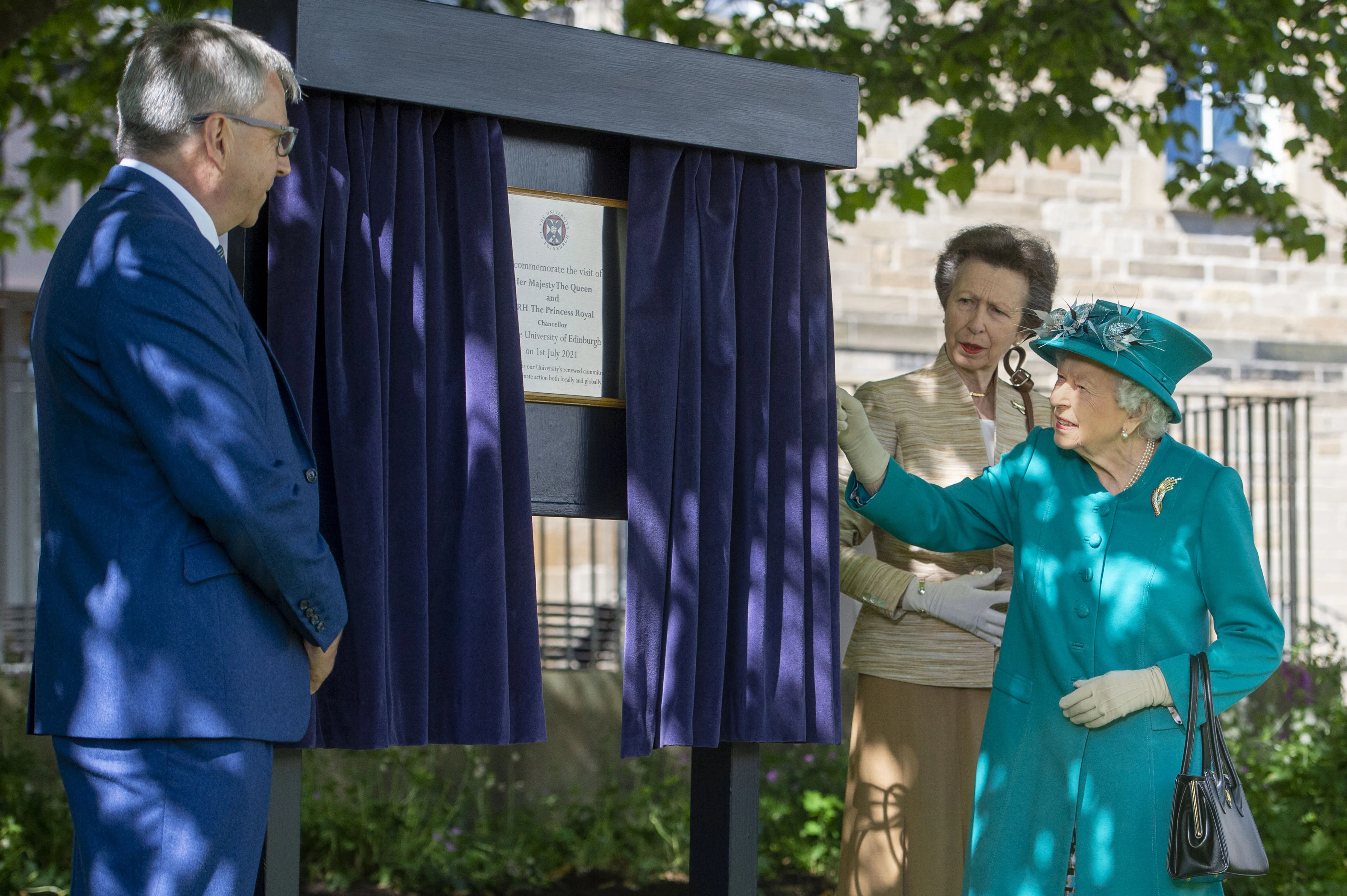 The Queen unveils a plaque at ECCI