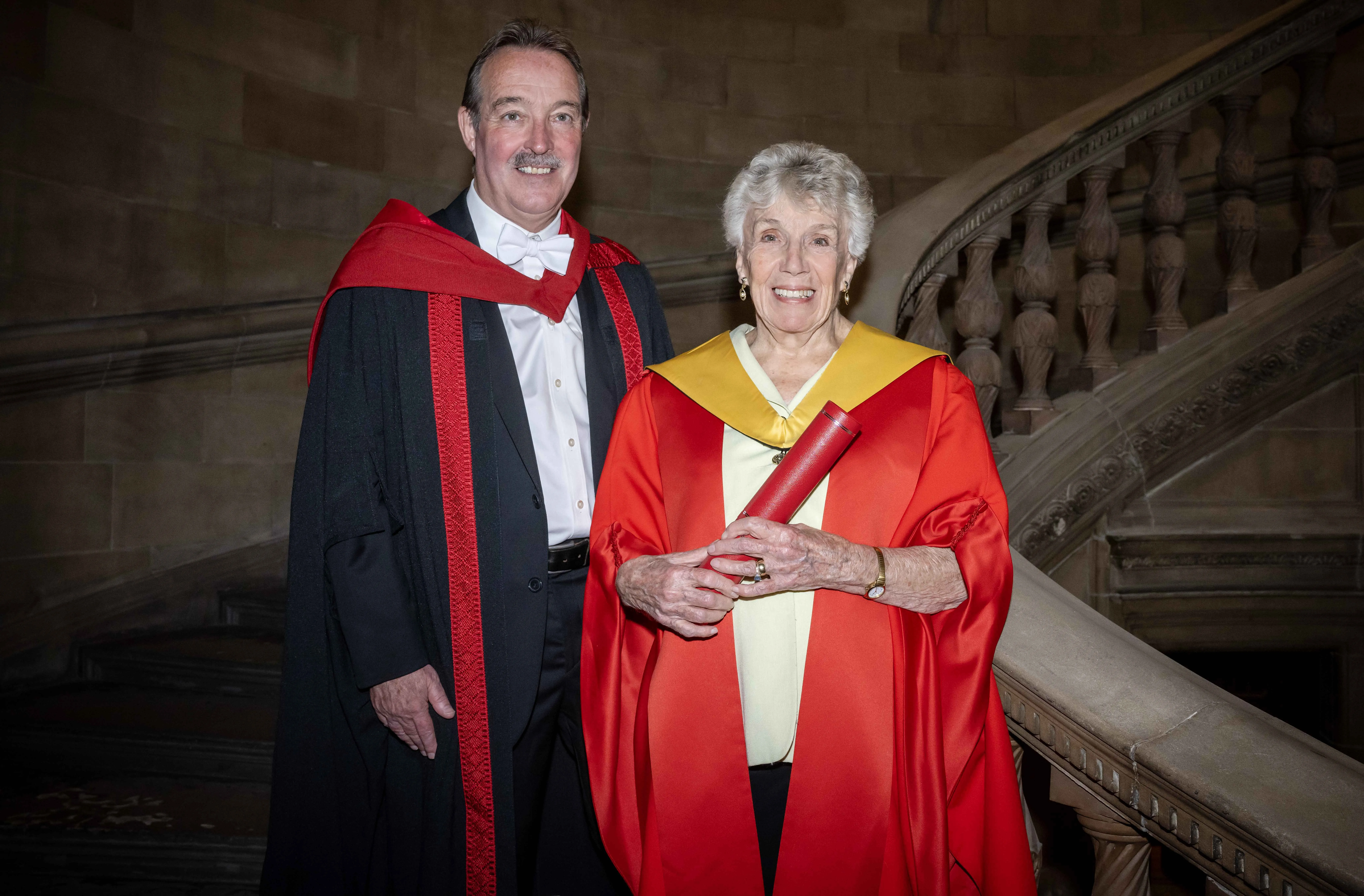 Professor Grant Jarvie and Patricia Liddell Russell pose with her father Eric Liddell's Honorary Degree