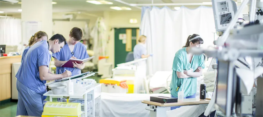 Nurses and doctors working in intensive care unit