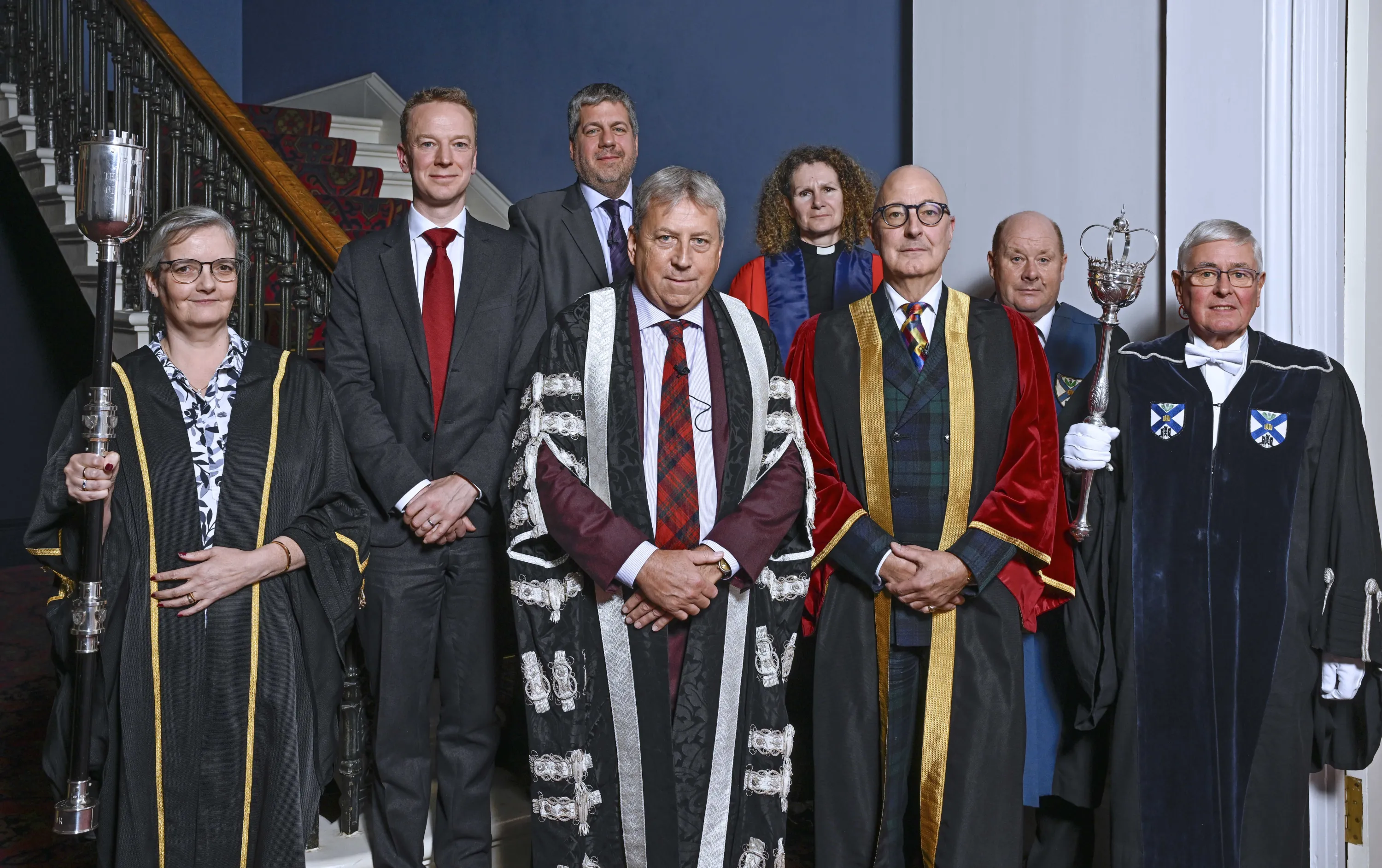 A group photo of University representatives, including the Principal, alongside the new Rector, Simon Fanshawe
