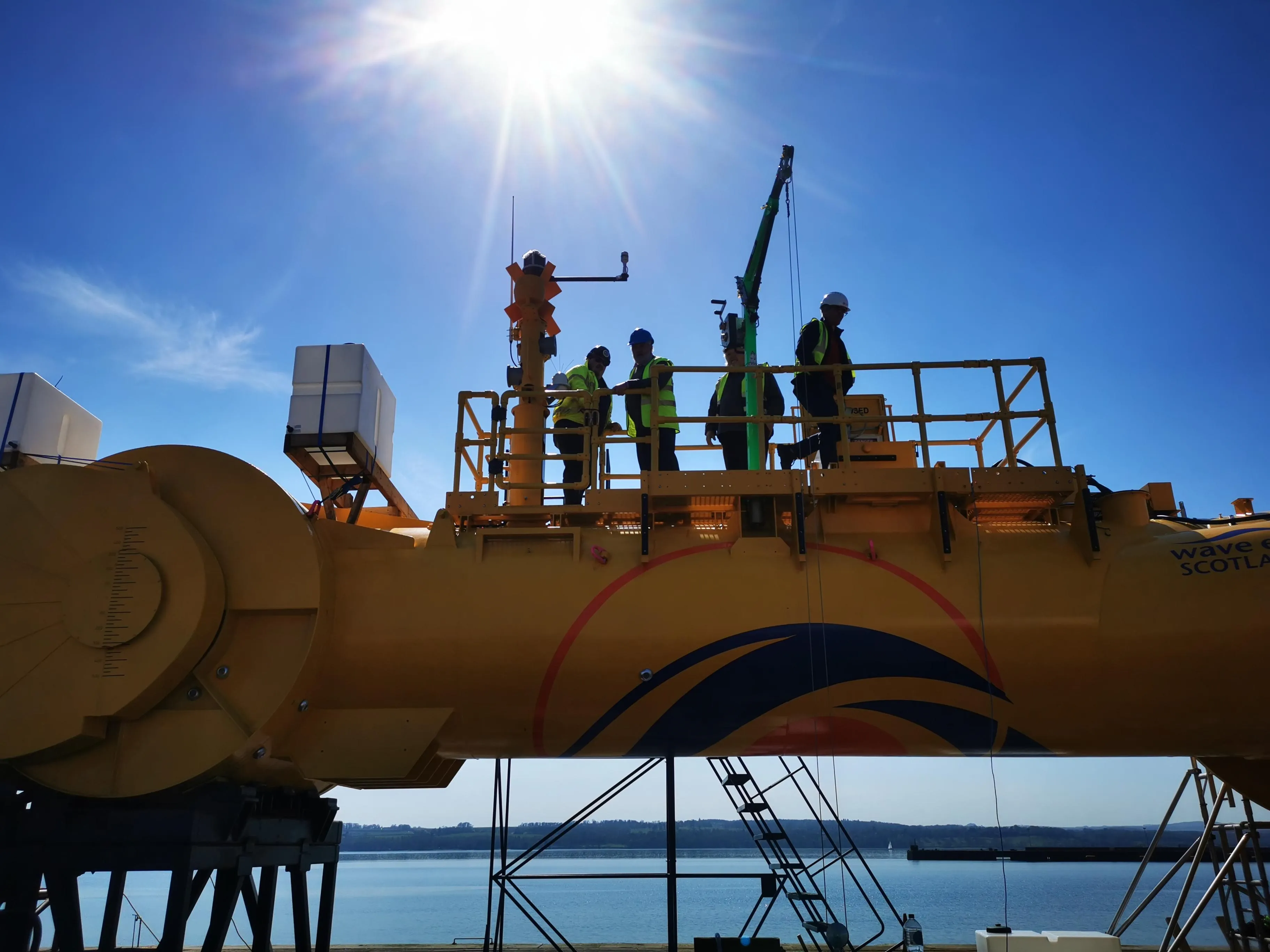 The CGEN team on Mocean Energy's BlueX wave energy machine.