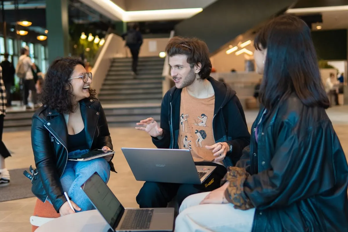 Students working together in a multi-purpose area within the Nucleus.