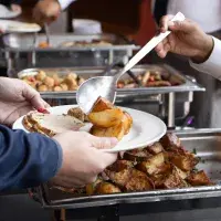 Roast potatoes and turkey on a plate