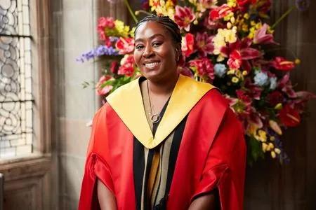 Dr Annabel Sowemimo receiving their honorary degree.