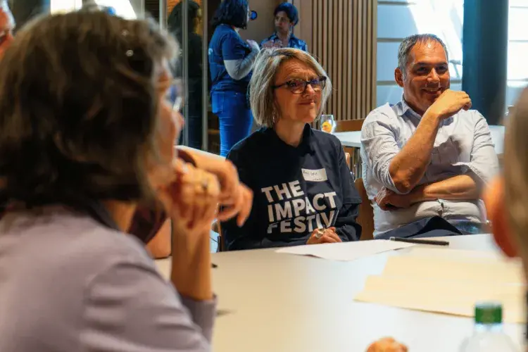 Colleagues during a session at The Impact Fesitval