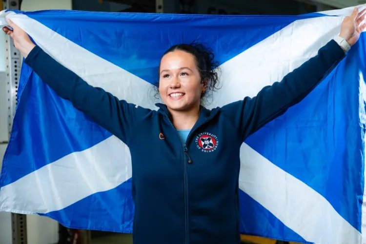 Weightlifter Maddie Rocher poses with a Saltire flag. 