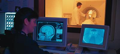 Staff using a Magnetic Resonance Imaging Scanner