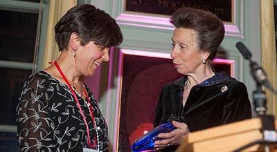 The Chancellor, HRH The Princess Royal, presents Dr Elizabeth Bomberg with her award