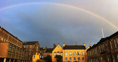 Photo of Moray House with rainbow overhead
