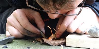 Student making fire