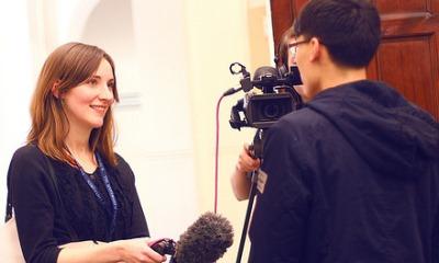 Student being interviewed on camera