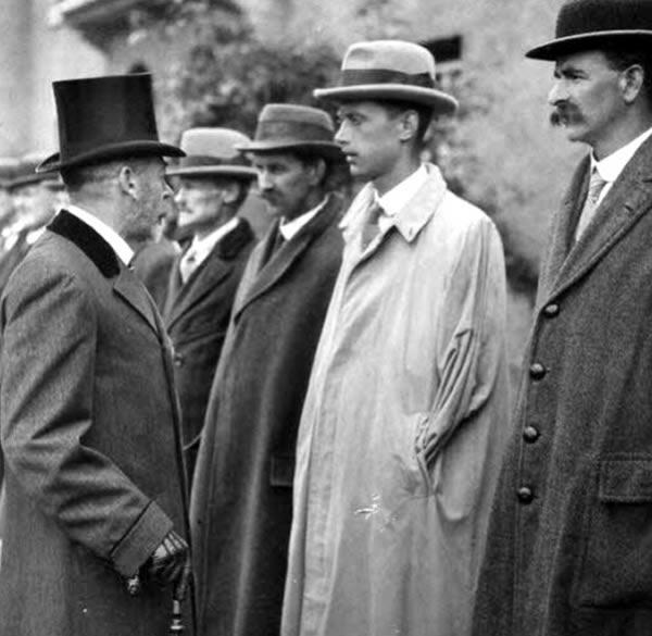 King George V meeting disabled veterans at the opening of Earl Haig Gardens where homes were built for ex-servicemen