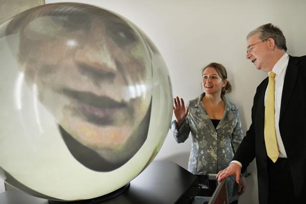 Mike Russell, Scottish Cabinet Secretary for Education, with the PufferSphere, a spherical display system developed by university firm Pufferfish