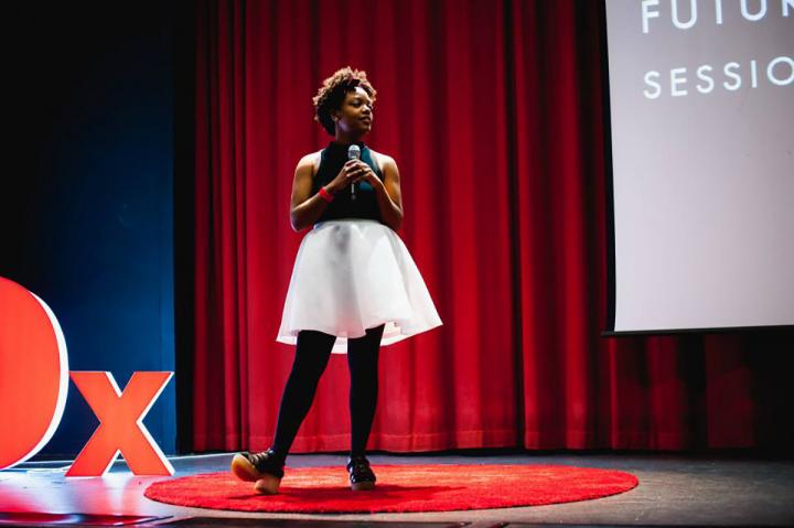 Briana Pegado hosting the TEDxUniversity of Edinburgh in George Square in 2015