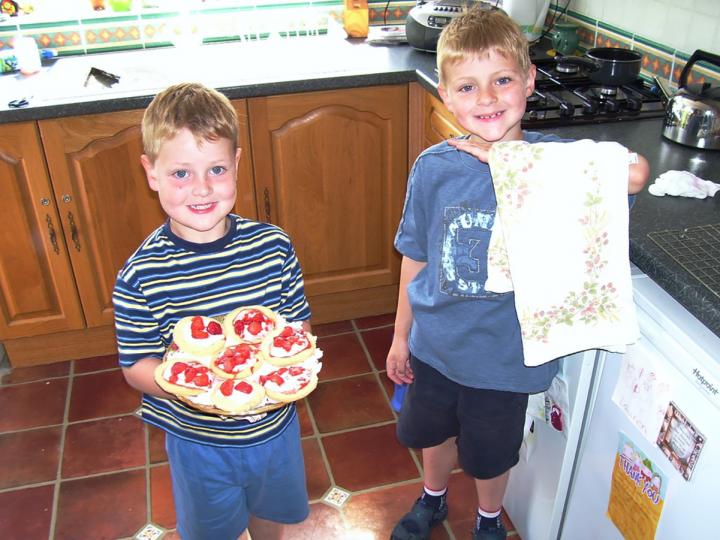 Peter Sawkins and his brother aged five and seven baking