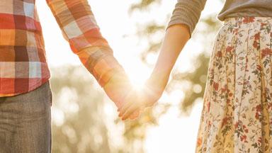 Couple holding hands