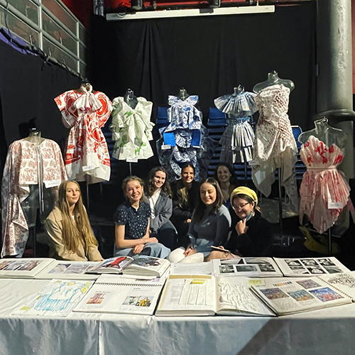 Changemaker Award 2023 - Textiles, Edinburgh College of Art - group photo with garments on mannequins in the background