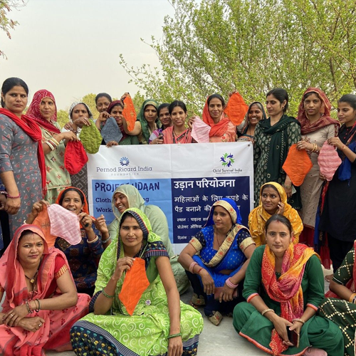 Changemaker Award 2023 - Sanitree - women holding fabric pads in India