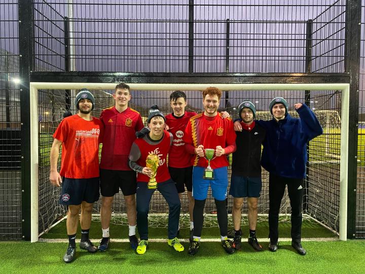 Winners of the festive fives cup lined up in football goals