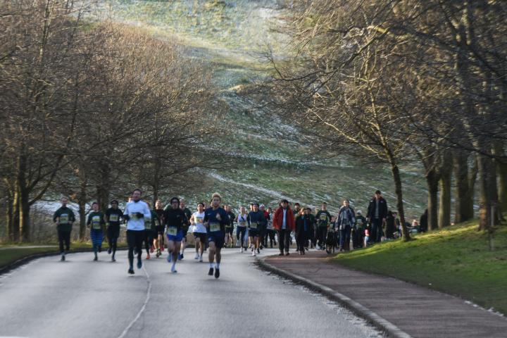 Runners competing in Holyrood park