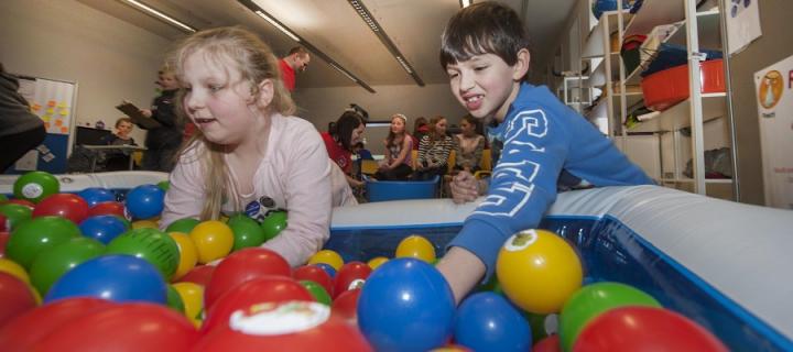 Participants in the Amazing Immunology workshop experience the 'rash decisions' ball pool