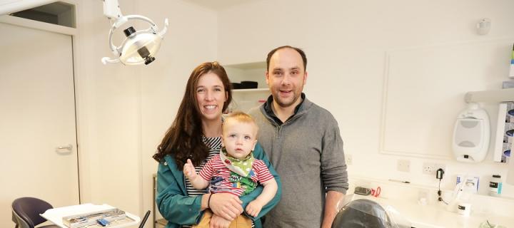 Amy, Scott and their son in their Kirkwall Dental Practice.