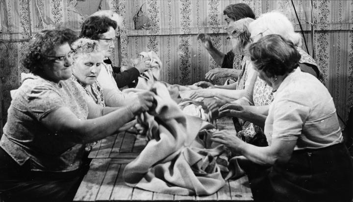 Cloth Waulking, Iochdar, South Uist, 1970. Photo by Ralph W Morton, (SSSA BV111 3 7678) 