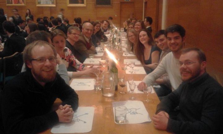 Students relaxing at dinner at the PhD workshop