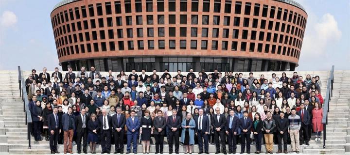 Image of all UoE and ZJE staff outside the newly opened Institute by the Principal