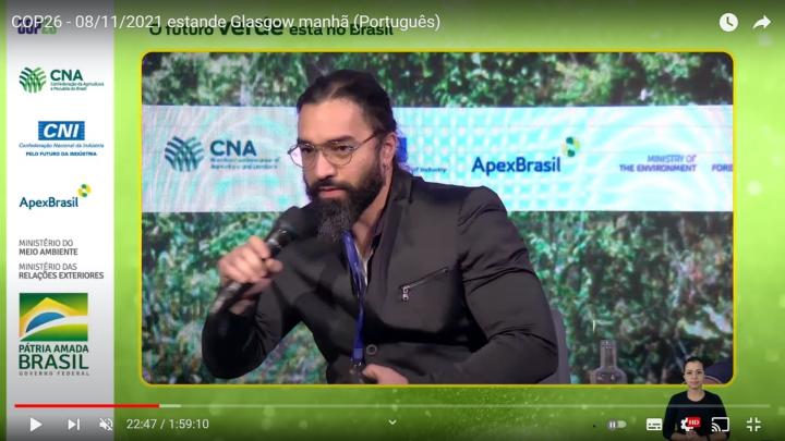 Screenshot of a YouTube video showing Dr Rafael De Oliveira Silva presenting at COP26 in 2021