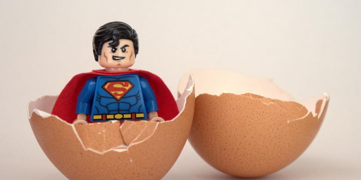 image of superman coming out of an egg