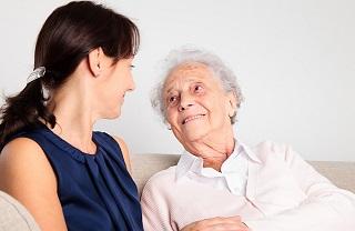 Carer with elderly woman