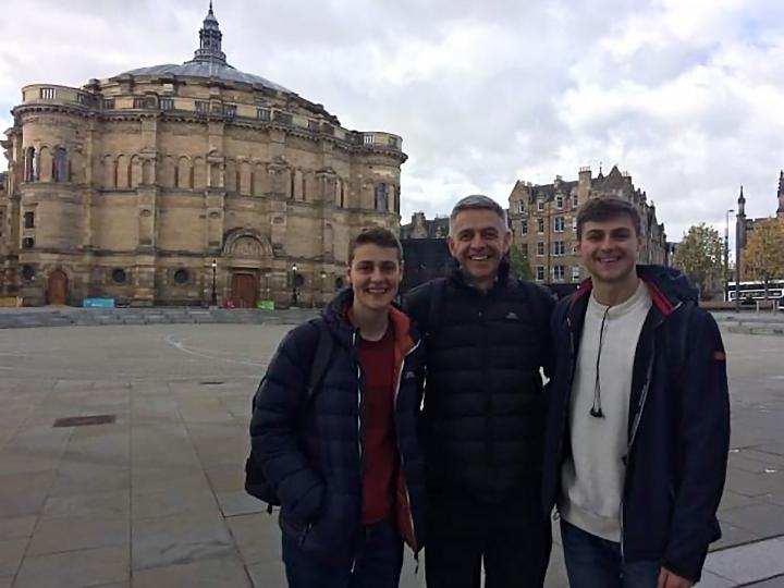 Peter with his dad, John, and brother, Andrew, who also studied at the University, pictured in Bristo Square, 2019