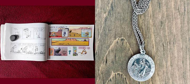 It's a Magical World (Calvin and Hobbes) by Bill Watterson and a Saint Christopher pendant