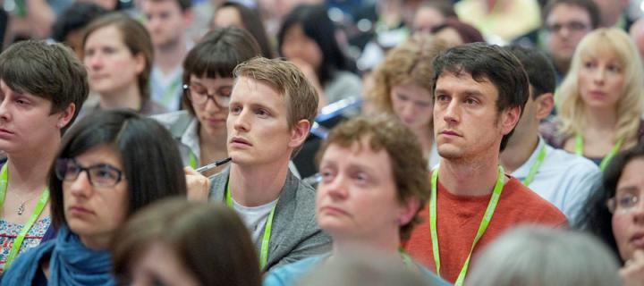Delegates listening to a talk at a conference